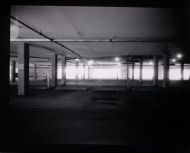 A parkade's smell, suppressed acoustics, and drab appearance makes you rush to the exit, Polaroid 450, 2 min @ f/8.8, Kentmere paper, Dektol 1:2