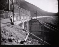 The backside of the spillway. Crumbling concrete, chain link fencing, and an engineered pile of dirt make up this dam.  Polaroid 450 using Kentmere VG paper