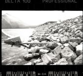 Over 1/2 Km of quarried rocks line the dam.  OM-2, Delta 100 film